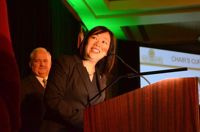 Lisl Liang accepts the Chair's Cup Award for 2016. Liang is the first to win the award twice.