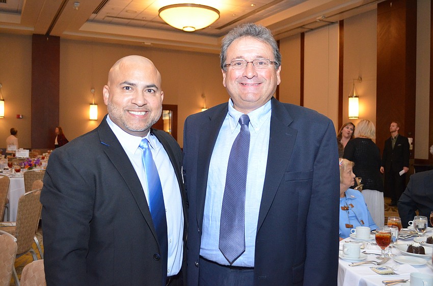 John Acevedo and Dr. Stephen Nicholas of the Community Aids Network.
