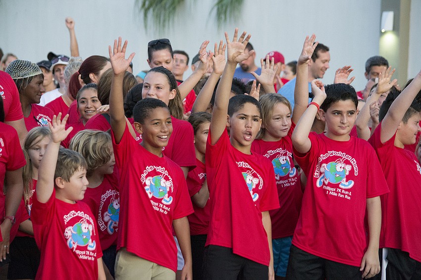 Students wait for the start of the 7K race.