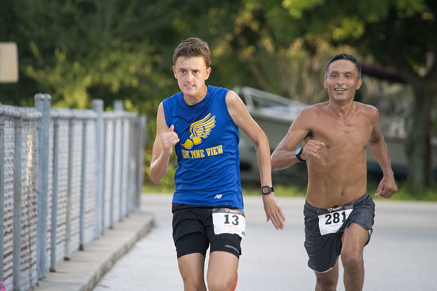 Connor Wozniak pulls away from Hector Guzman just feet away from the finish line.