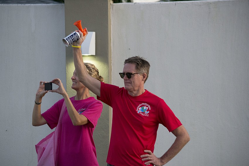 Event sponsor Si McAninch has the honor of starting the 7K.