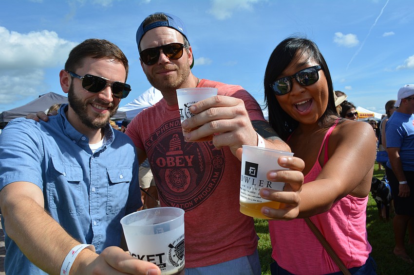 Charlie Searls, Ryan Henderson and Danbee Choi, of Sarasota, started their tastings with a Scottish ale and a blonde ale.