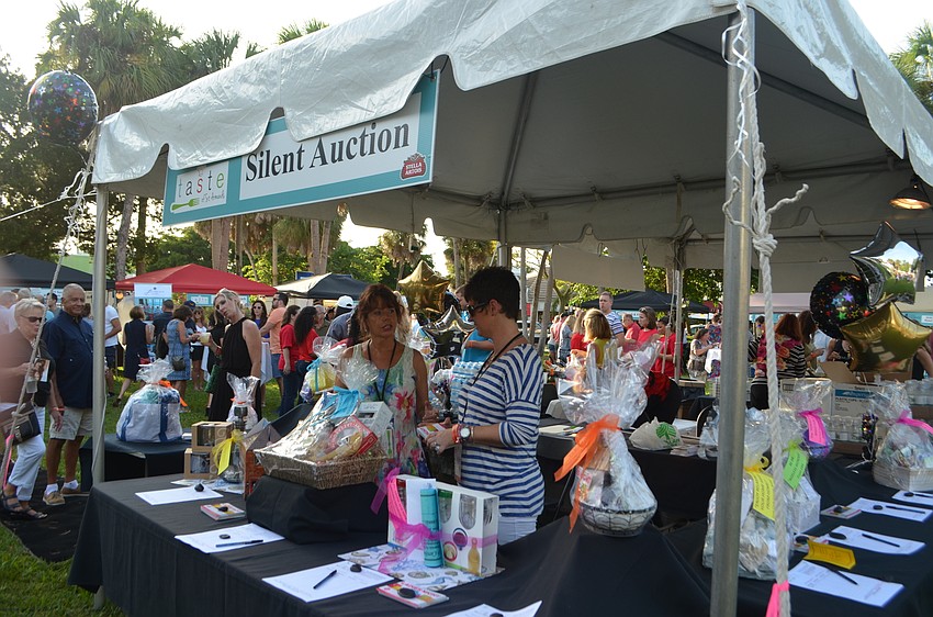 The 7th annual Taste of St. Armands included a silent auction that benefited Take Stock in Children.