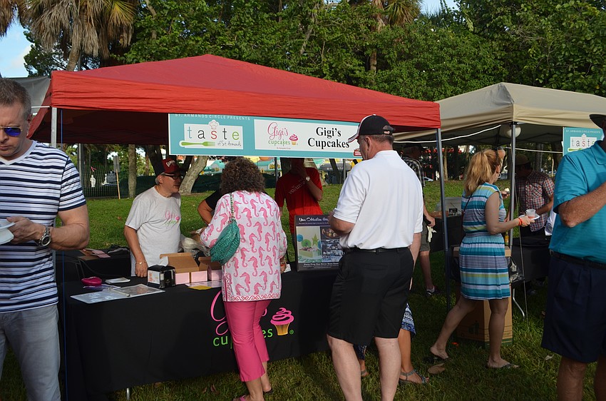 Taste of St. Armands attendees line up at the Gigi’s Cupcakes tent.