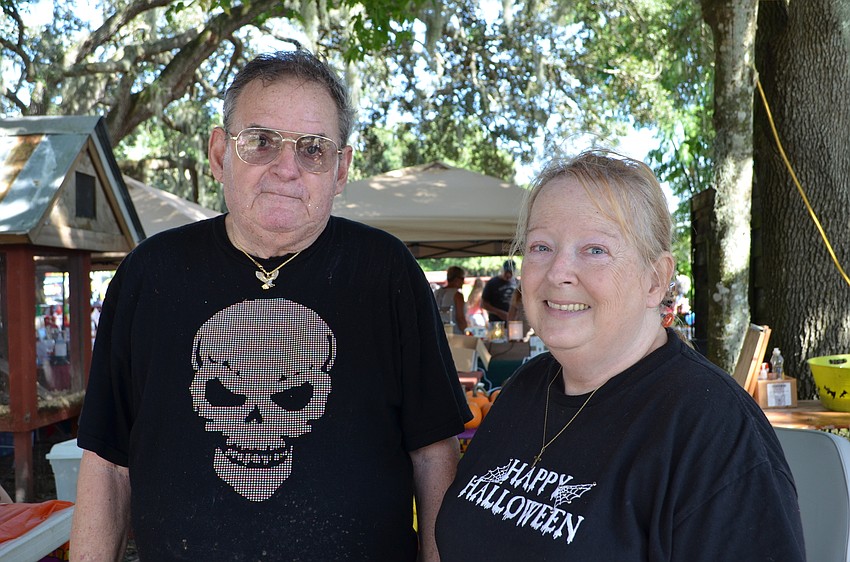 Cliff and Marie Gartside run the pumpkin decorating booth at Fruitville Grove.