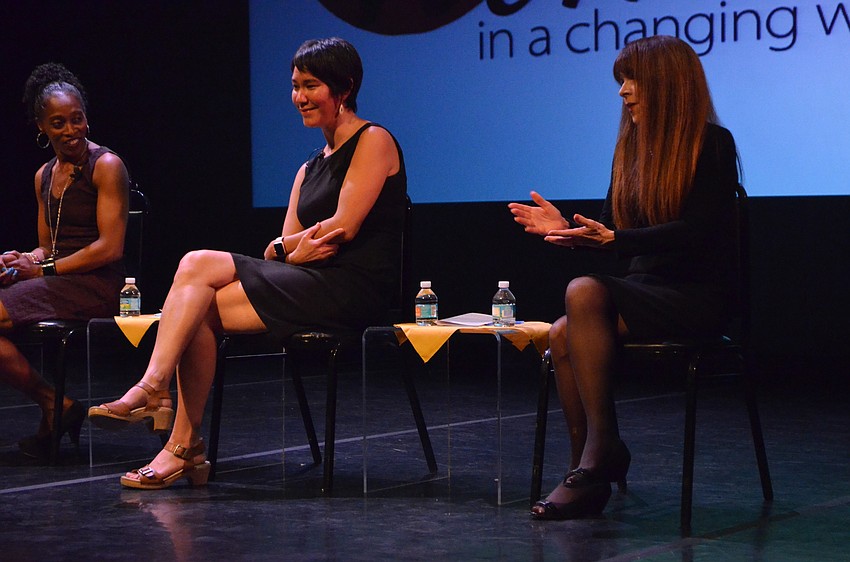 Gail Devers and Joan Kane listen to Paulette Pasciuti explain how her career changed course as her passions developed.