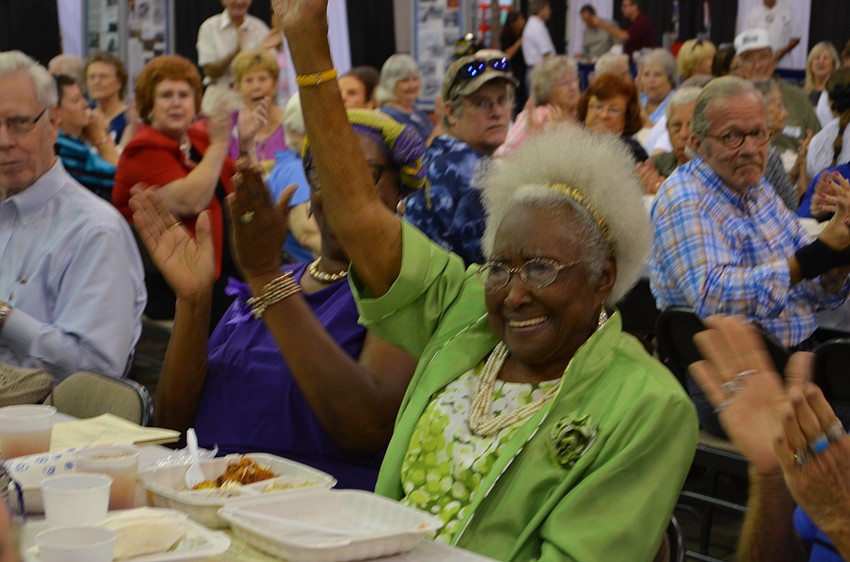 Glossie Atkins was recognized as the oldest in the room at age 98.