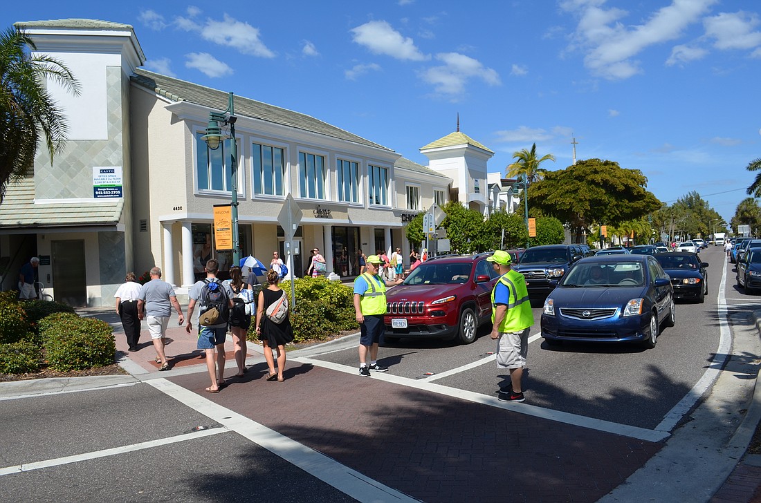 Pedestrian traffic managers worked on St. Armands Circle from March 9 to April 3 during an FDOT pilot program.