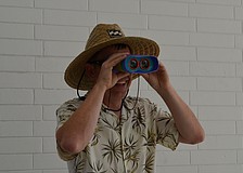 Sarasota High School Assistant Principal Merlin Schenk completed his outfit with binoculars.