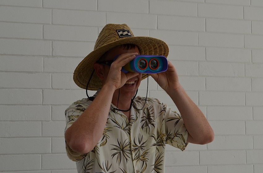 Sarasota High School Assistant Principal Merlin Schenk completed his outfit with binoculars.