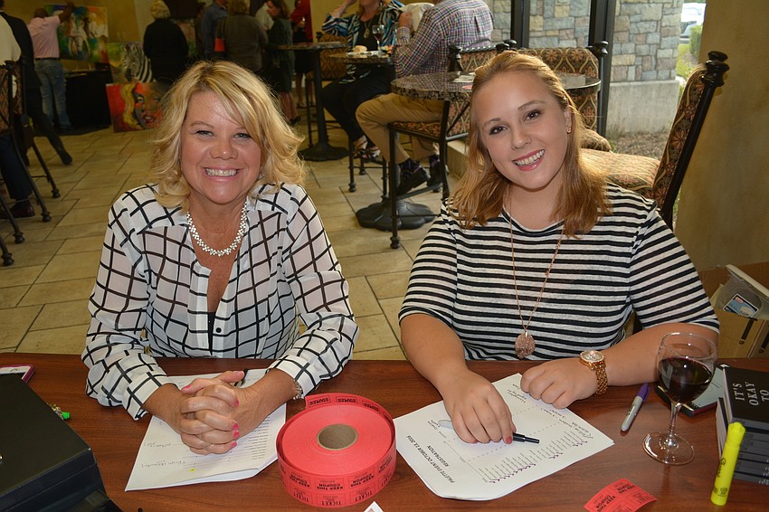 Amy Mann, of Sabal Harbour, and Casey Porter, of Tara, register guests. Mann's husband, Dave, serves on the foundation's board and Porter was Payton Wright's cousin.