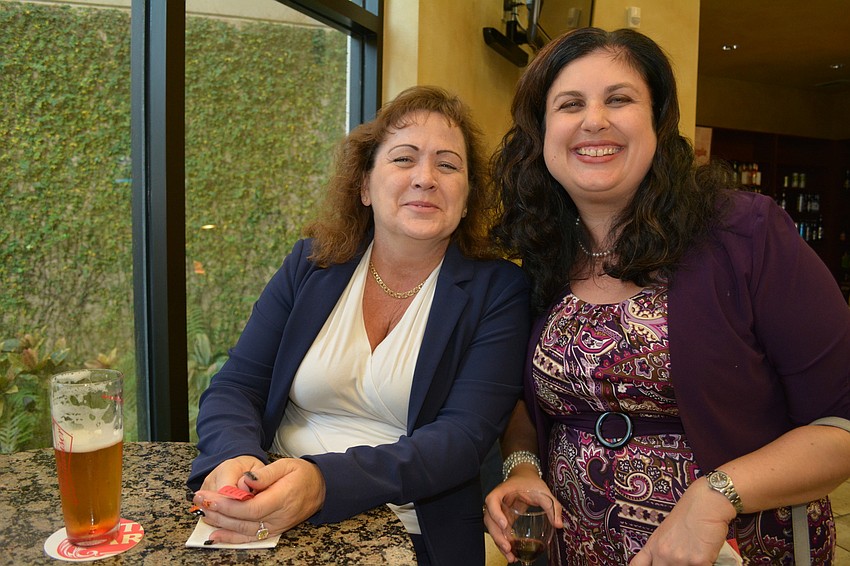 Kathleen Gratz of CBiz, joins Christine Robinson, a fellow Sarasota resident.
