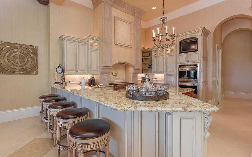 All your guests could be cozied up to the island while you whip up culinary delights. You'll never miss a story.