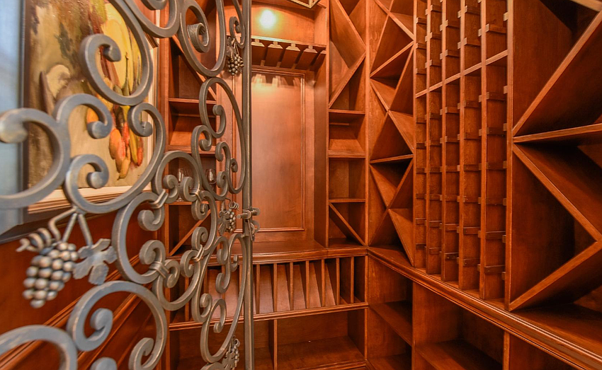 The home offers amenities such as impressive wine and food storage areas.