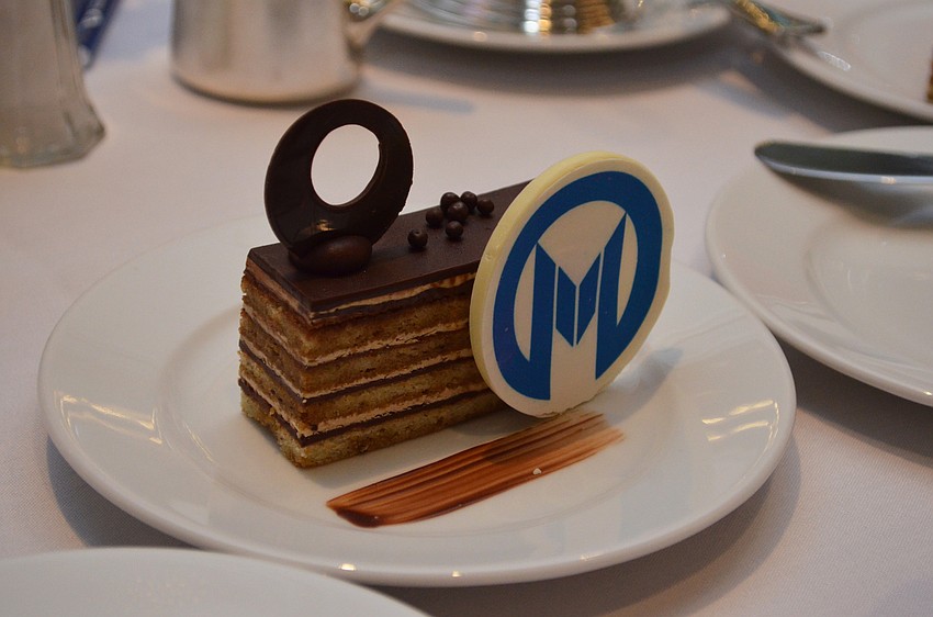 Guests enjoyed chocolate cake adorned with the Moffitt logo for dessert.