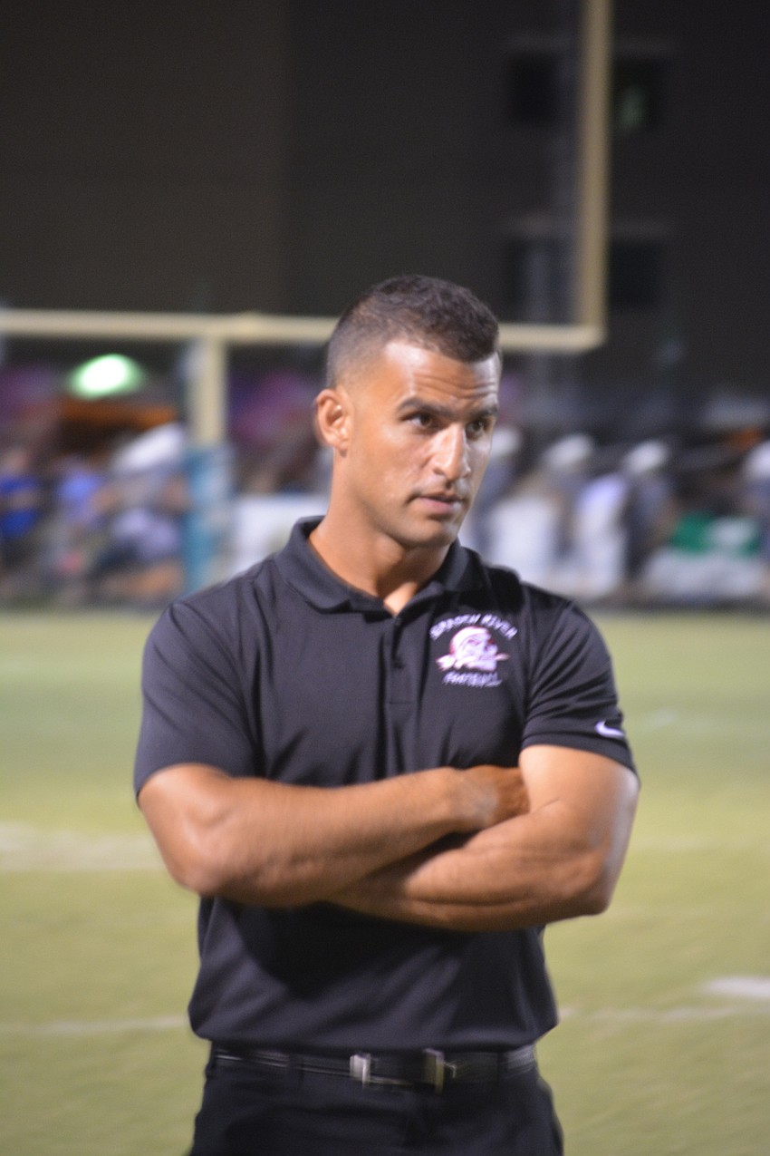 Braden River coach Curt Bradley stares into the distance during his team's 42-35 loss against Venice.