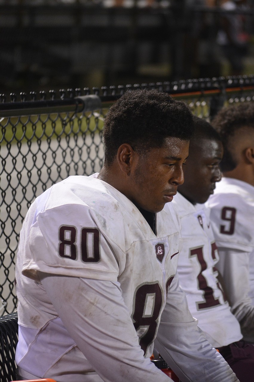 Braden River defensive end Taylor Upshaw gets a breather on the bench during the second half of his team's 42-35 defeat against Venice.