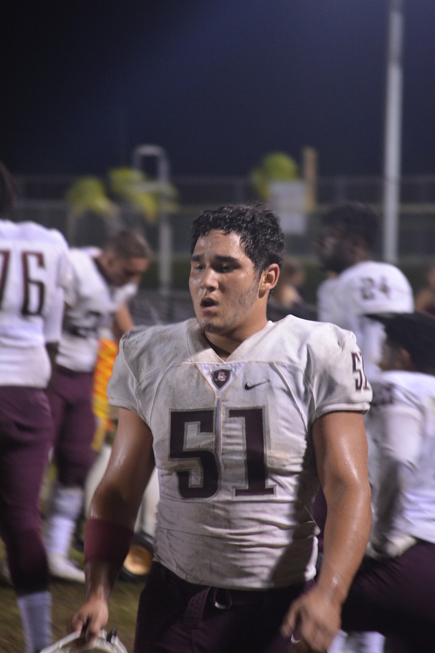 Braden River senior linebacker Noah Arce walks the sideline after getting an interception late in his team's 42-35 loss to Venice.