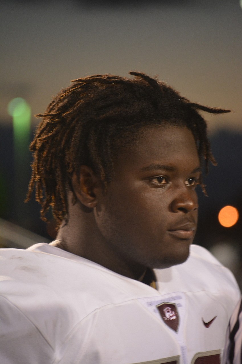 Braden River senior Deqwunn McCobb looks at the opposing captains during the coin toss before his team's 42-35 defeat to Venice.