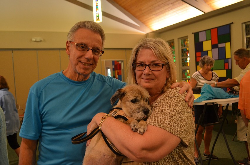 Gene and Noreen Luca with Colin, a 13-year-old border terrier