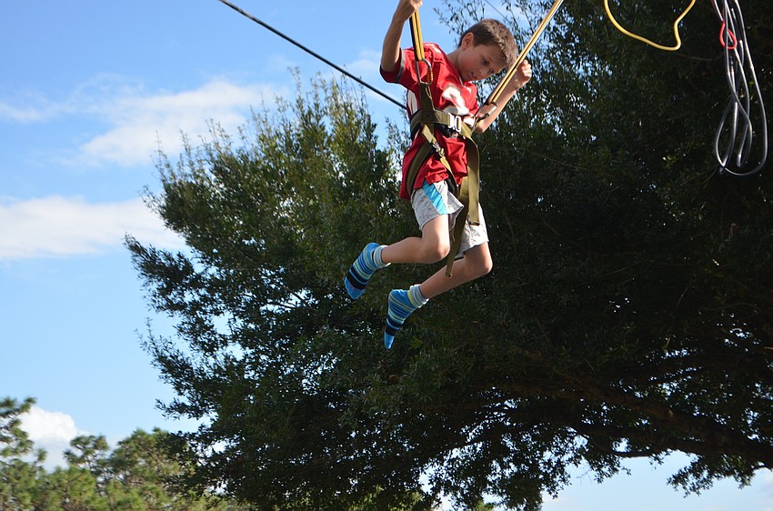 Odessa's Daniel Lawrence, 10, jumps for joy on a trampoline.