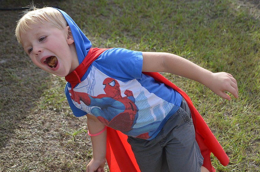 Valrico 3-year-old Jack Springer wants the whole world to see the doughnut he is enjoying.