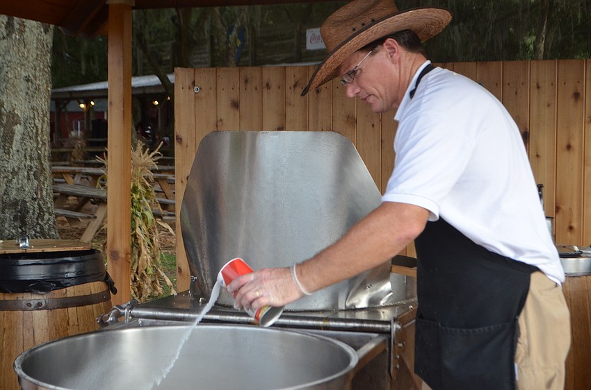Jacksonville's Henry Towner, 50, prepares kettle corn.