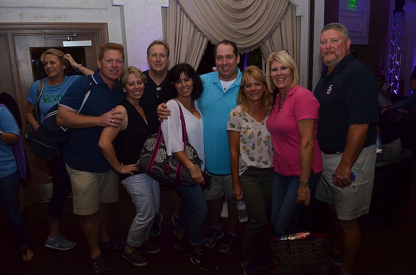 Members of Team Crescent pose after arriving at the Raise the Roof Party.