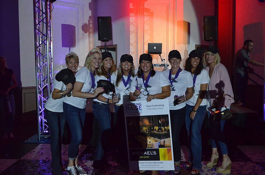 SPARCC Sirens pose after winning Team Fundraising First Place Prize.