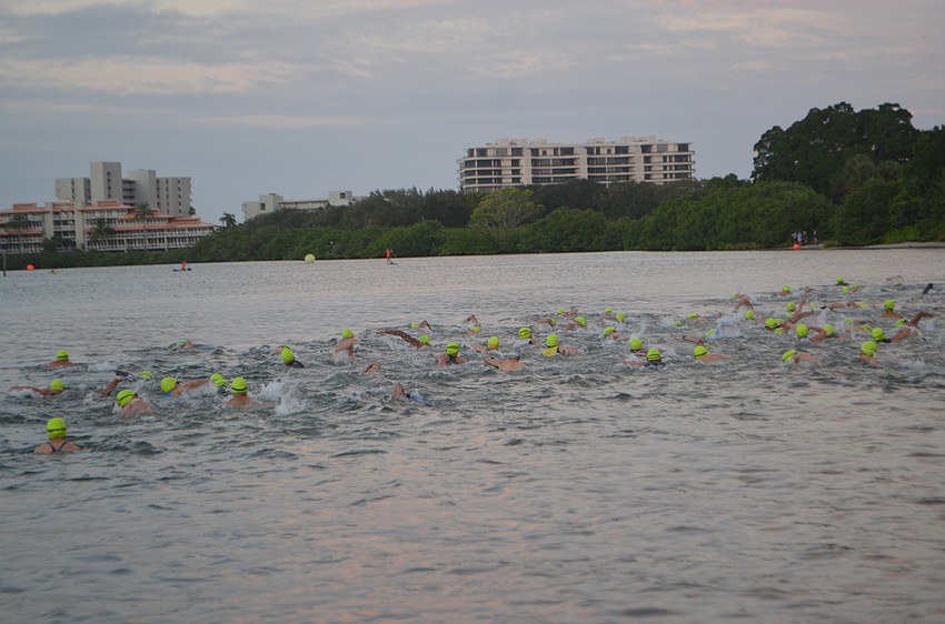 Swimmers take off during the Longboat Key Triathlon on Oct. 16.