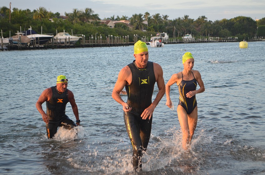 Triathletes complete the swimming portion of the Longboat Key Triathlon on Oct.16.