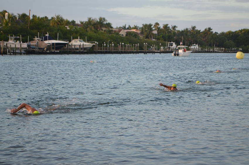 Triathletes complete the swimming portion of the Longboat Key Triathlon on Oct.16.