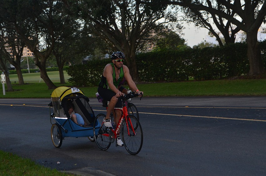 Greg Simony of Shelby Township, Mich., starts the biking portion of the Longboat Key Triathlon on Oct. 16.