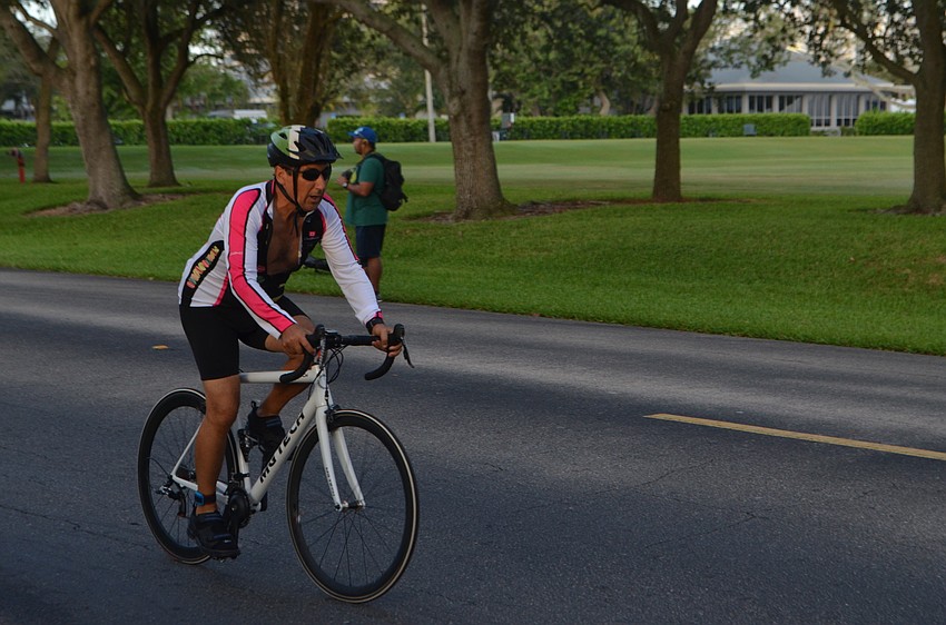 Bikers begin their route during the Longboat Key Triathlon on Oct. 16, 2016.