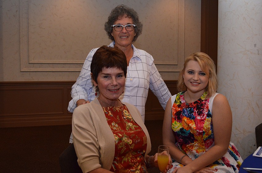 Wendy Surkis (standing) with Nancy O’Neil and Rebecca Morrello