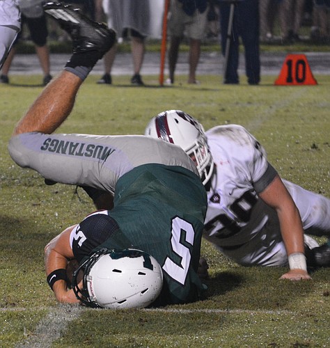 Lakewood Ranch quarterback Justin Curtis and the Mustangs offense have taken their lumps this season.