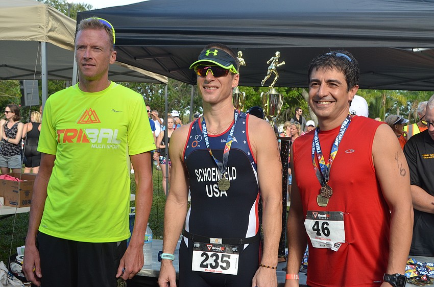 Olympic Triathlon top two male finishers Jon Noland, Winston Schoenfeld and sprint triathlon participant Gonzalo Carrizo