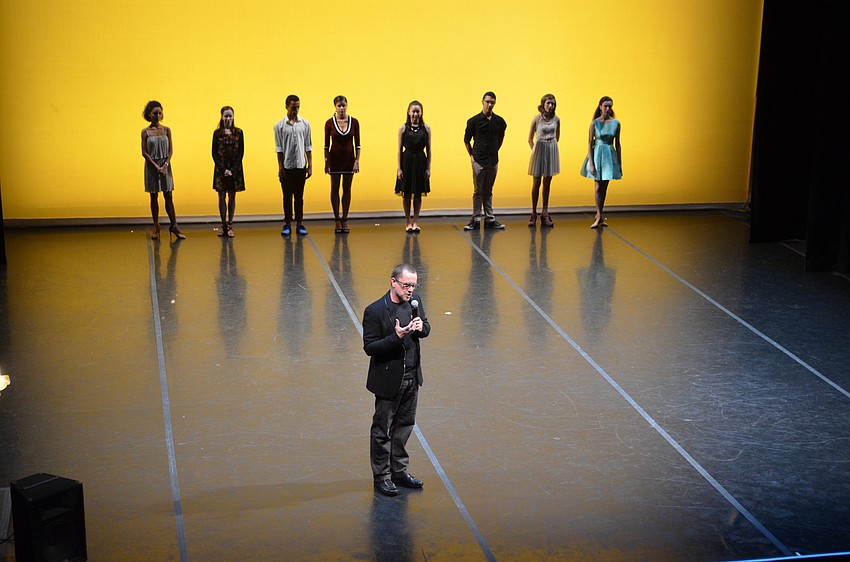 Director Iain Webb explains what role the trainees (standing behind him) play in the company.