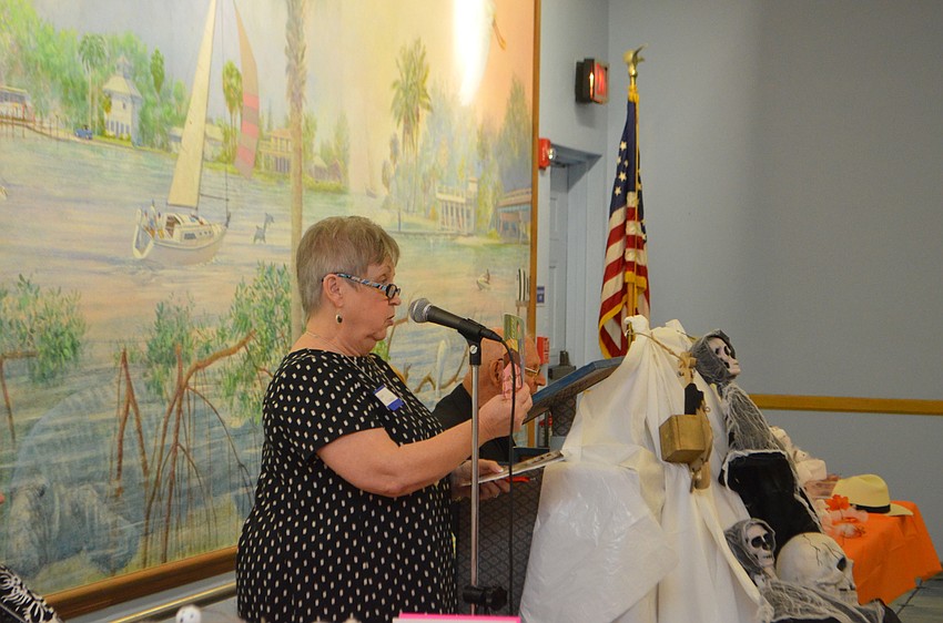 Guest speaker Virginia Holleran from the Christ Child Society introduces herself to the crowd.