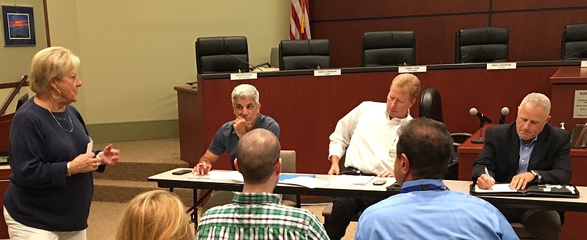 Longboat Key Chamber of Commerce President Gail Loefgren, left, at a Longboat Key meeting Oct. 10 with Sarasota County Area Transit planning manager Chris DeAnnuntis, Manatee County Area Transit division manager Will Steele and SCAT director Rocky Burke.