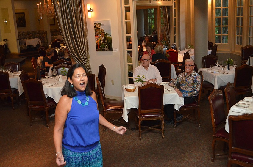 Kiran Kimbell sings during a Gloria Musicae a performance at Amore by Andrea.