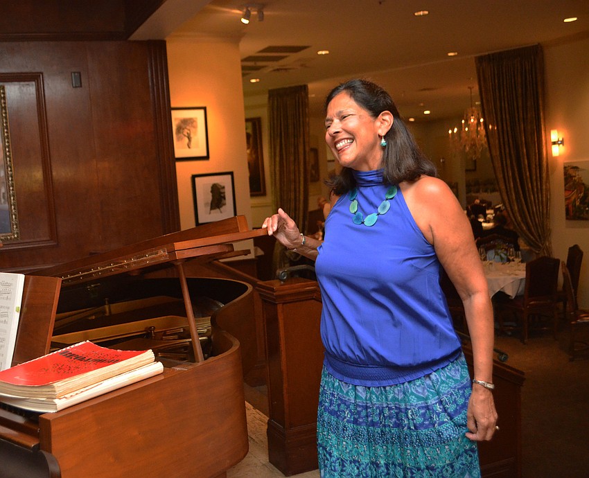 Kiran Kimbell smiles during Gloria Musicae a performance at Amore by Andrea.