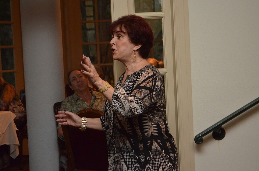 Sharon Greene  sings during a Gloria Musicae a performance at Amore by Andrea.