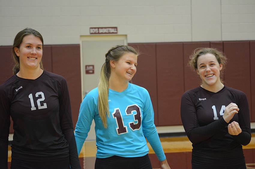 Riverview seniors Courtney Searles and Samantha Norden and sophomore Tricia Robustelli share a laugh before the Rams' district title match against Newsome on Oct. 20.