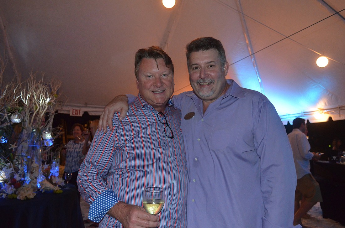 Wine consultant Michael De Loach and Bob Weil, Longboat Key Club food and beverage director at last year's Bacchus on the Beach.
