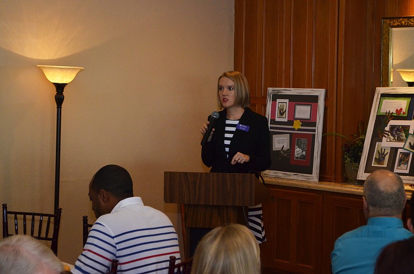 SPARCC CEO and President Jessica Hays welcomes guests and explains that domestic violence is not “a political issue.”