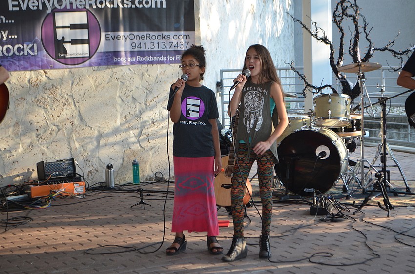 Shirley Fehr and Aliyah Clyburn sing “Roar” by Katy Perry at Mote’s Night of Fish, Fun and Fright on Oct. 21.