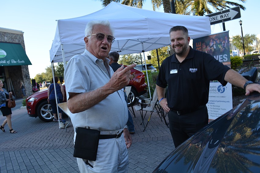 Jim Martire, of Lakewood Ranch, talks about the state of Indiana and other topics with Wilde Maserati's Jordan Blaugh, who was out showcasing vehicles on the street.
