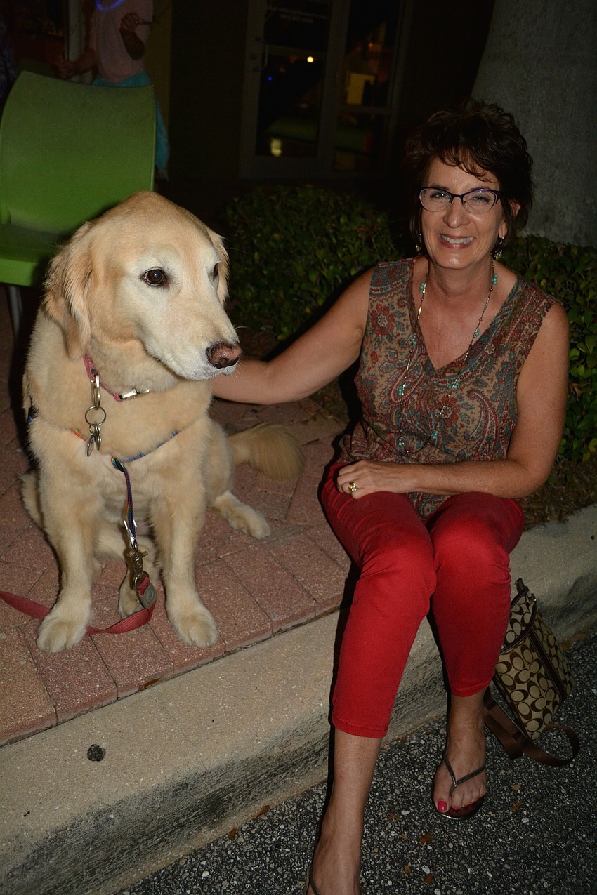 Maggie, a new Lakewood Ranch resident, makes a new friend with Terri Burnside, of Sarasota.