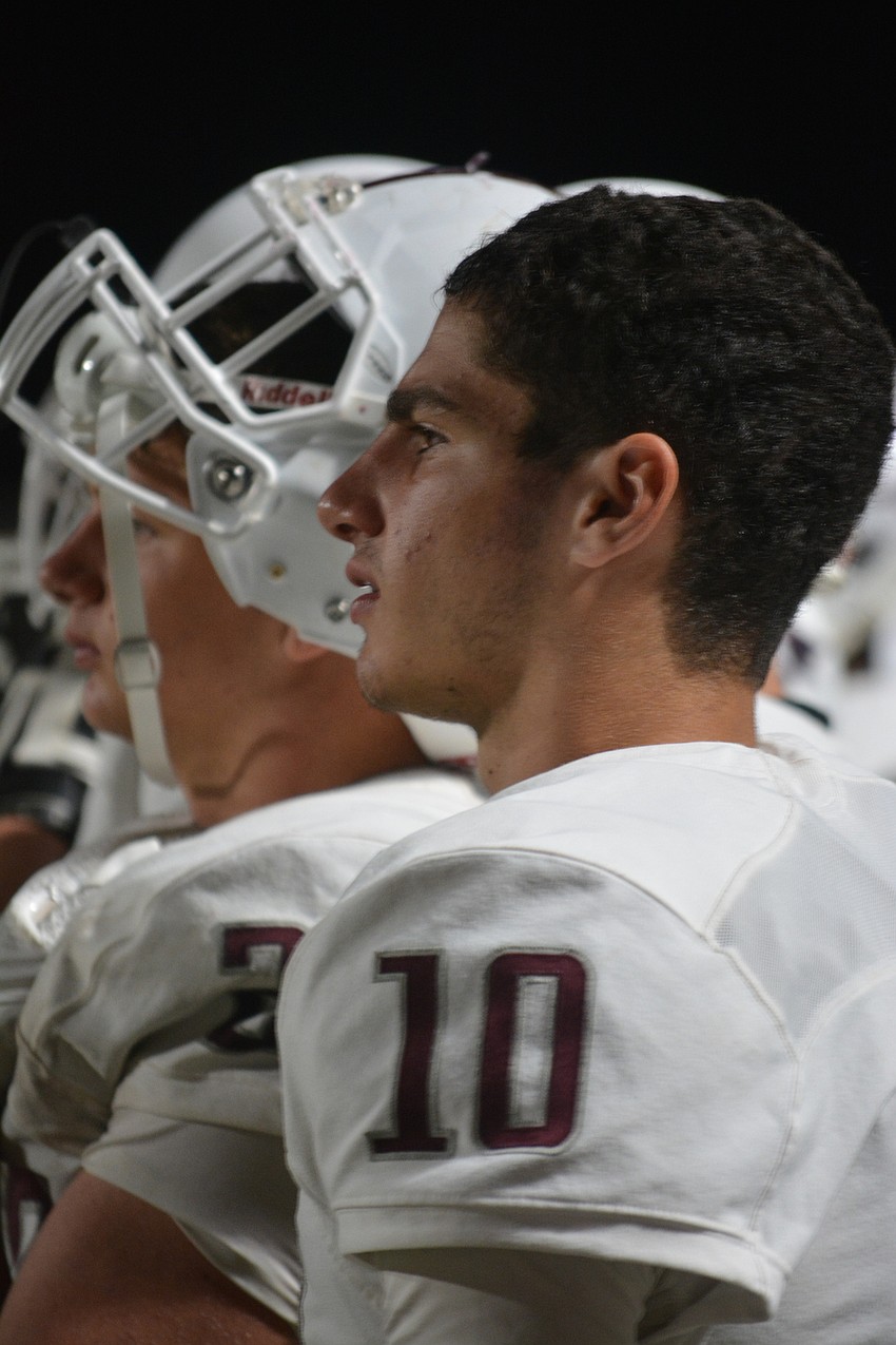 Braden River quarterback Louis Colosimo watches his backup, sophomore Jake Hepler, take the reigns in the second half of the Pirates' 35-0 win over Palmetto on Oct. 21.